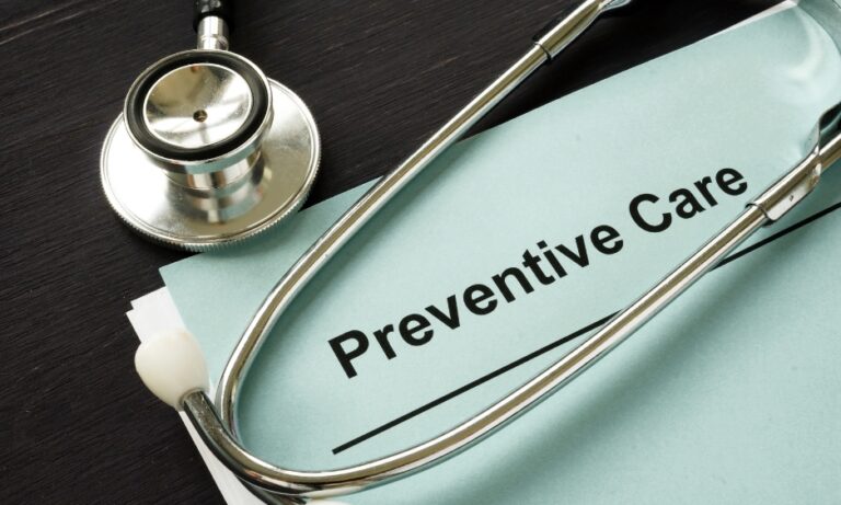 Stethoscope resting on a folder labeled Preventive Care