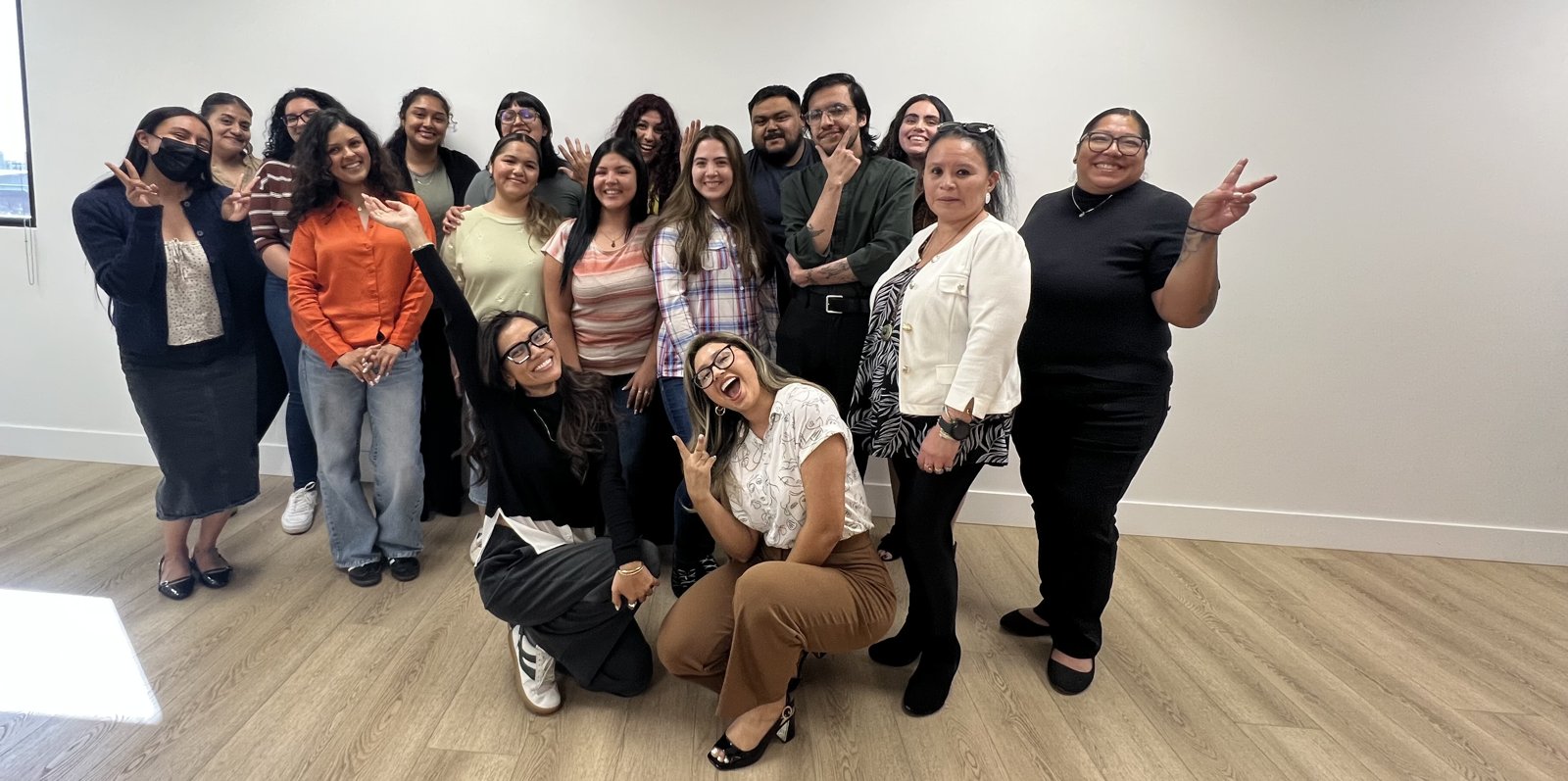 Health Bridge teammates together at the office